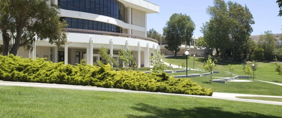 Commercial grounds in Worthington, OH, with trees and green lawn.