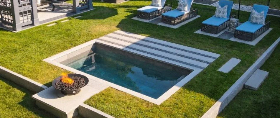 Fire pit by a pool in Upper Arlington, OH.