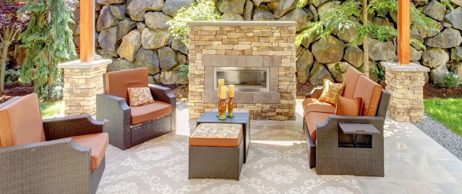 Outdoor fireplace in Upper Arlington, OH, with furniture.