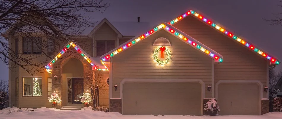 House in Upper Arlington, OH, with colorful holiday lights.