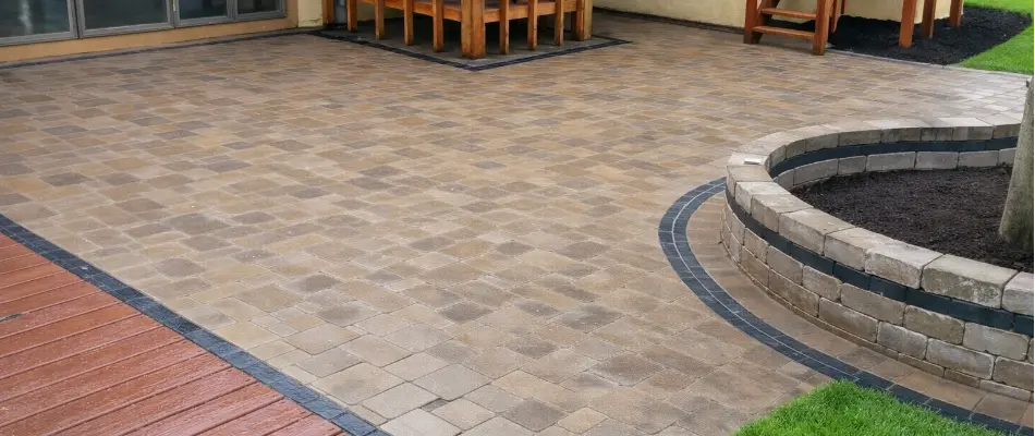 Paver patio in Westerville, OH, with planter area.