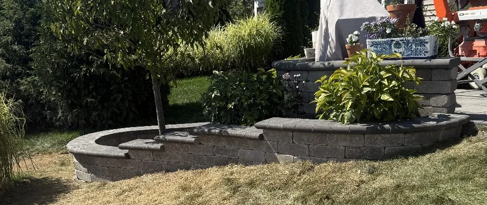 Retaining wall in Upper Arlington, OH, with planter bed.