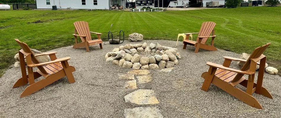 Wooden chairs around a fire pit in Upper Arlington, OH.